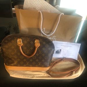 Louis Vuitton Alma Handbag